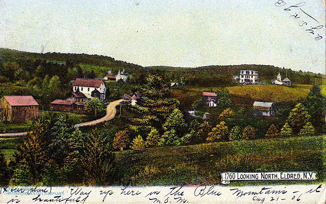 Looking north to Eldred, 1906. Methodist Church on the left; Congregational Church on the right.