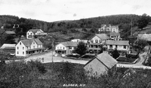 Eldred, after 1900.  The Parker House, built in the early 1870s, is opposite a later Eldred schoolhouse.